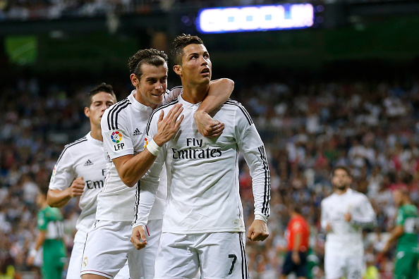 Cristiano Ronaldo (R) of Real Madrid celebrates with his teammate Gareth Bal